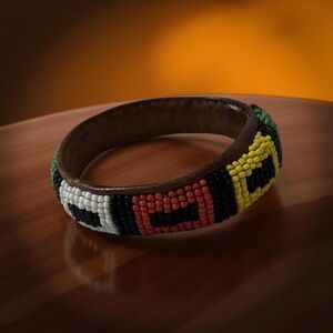 Beaded Leather Bracelet with Red, Black, White, green and yellow Design